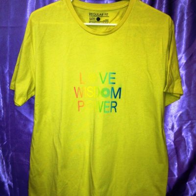 Love Wisdom Power on yellow shirt